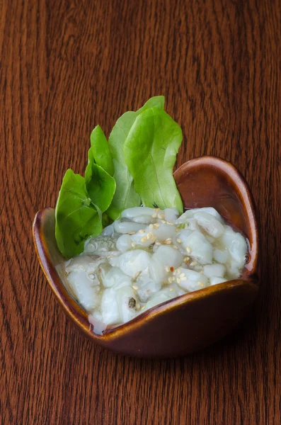 Cocina japonesa. pulpo de sushi en el fondo — Foto de Stock