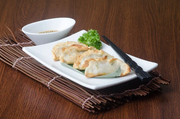 Chinese dumplings on the background — Stock Photo, Image