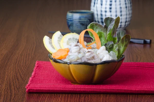 Cocina japonesa. pulpo en el fondo — Foto de Stock