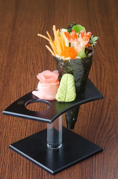 Japanse keuken. hand roll op de achtergrond — Stockfoto