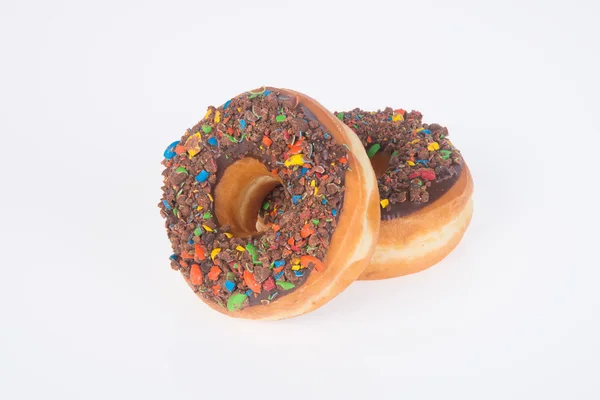 Schokoladen-Donuts auf weißem Hintergrund — Stockfoto