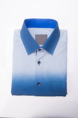 gömlek. bir arka plan üzerinde katlanmış erkek gömlek