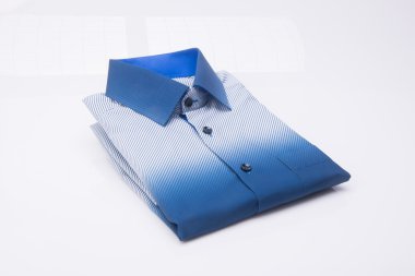 gömlek. bir arka plan üzerinde katlanmış erkek gömlek