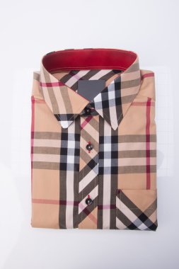 gömlek. bir arka plan üzerinde katlanmış erkek gömlek