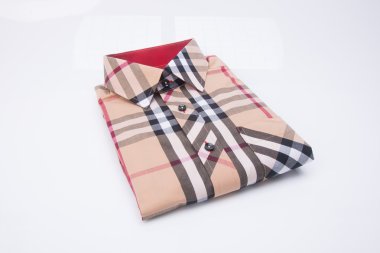 gömlek. bir arka plan üzerinde katlanmış erkek gömlek