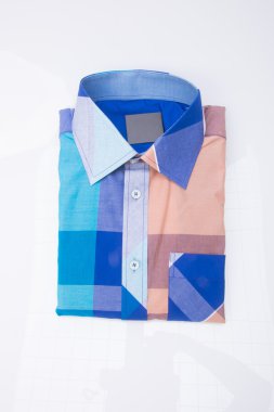 gömlek. bir arka plan üzerinde katlanmış erkek gömlek