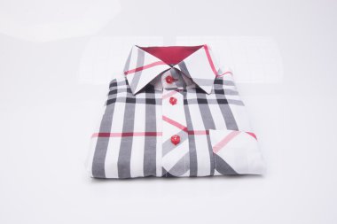 gömlek. bir arka plan üzerinde katlanmış erkek gömlek