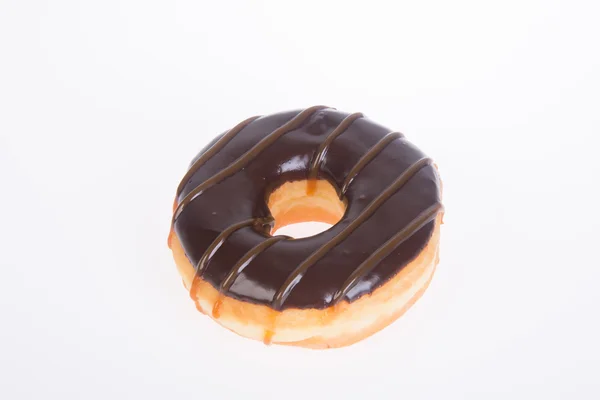 Donuts de chocolate em um fundo branco — Fotografia de Stock