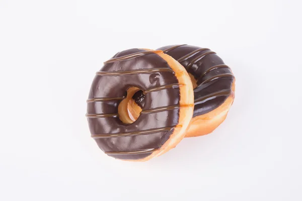 Chocolate donuts on a white background — Stock Photo, Image