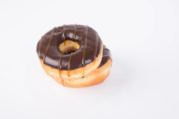 Schokoladen-Donuts auf weißem Hintergrund — Stockfoto