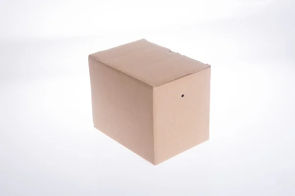 Caixa. caixa de papelão no fundo — Fotografia de Stock