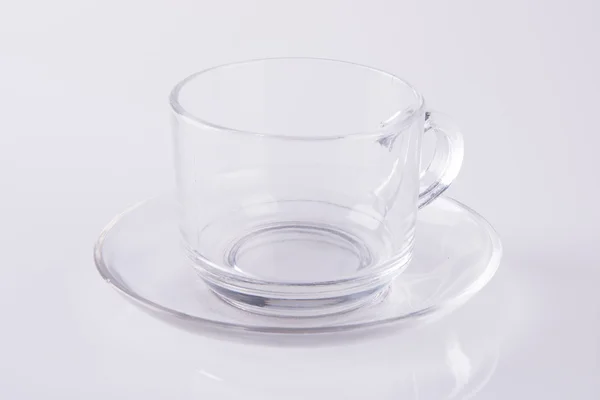 Glas of thee glas cup op een achtergrond. — Stockfoto