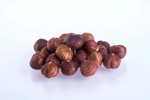 Hazelnut. hazelnut di latar belakang — Stok Foto