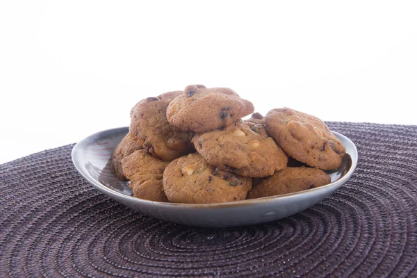 Choklad chips cookies på bakgrund — Stockfoto