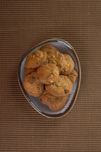 Chocolate chips cookies on background — Stock Photo, Image