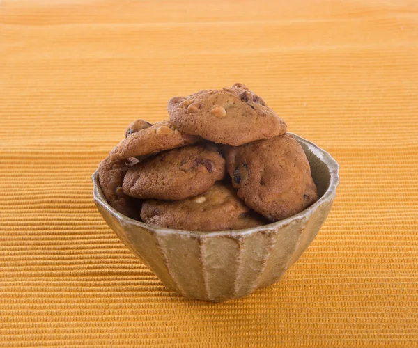 Galletas de chips de chocolate en el fondo —  Fotos de Stock