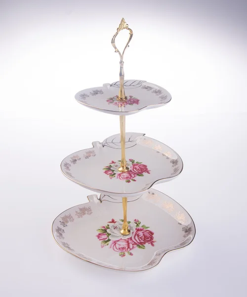 tray. three tier serving tray on a background.