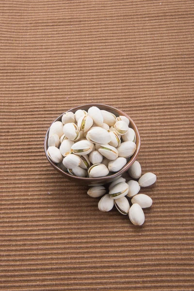 Nuts. pistachios on the background — Stock Photo, Image
