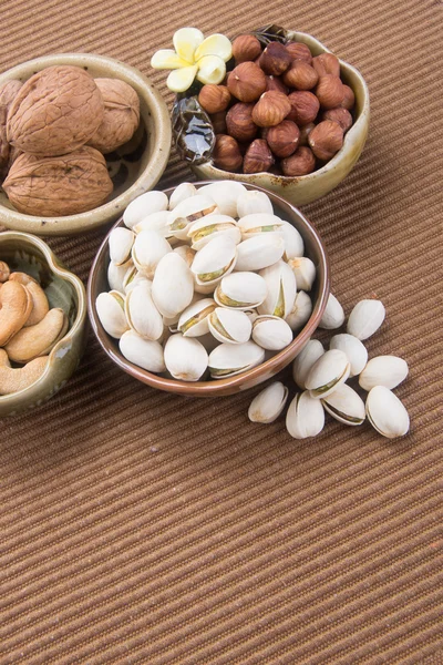 Nuts. mixed nuts on the background — Stock Photo, Image