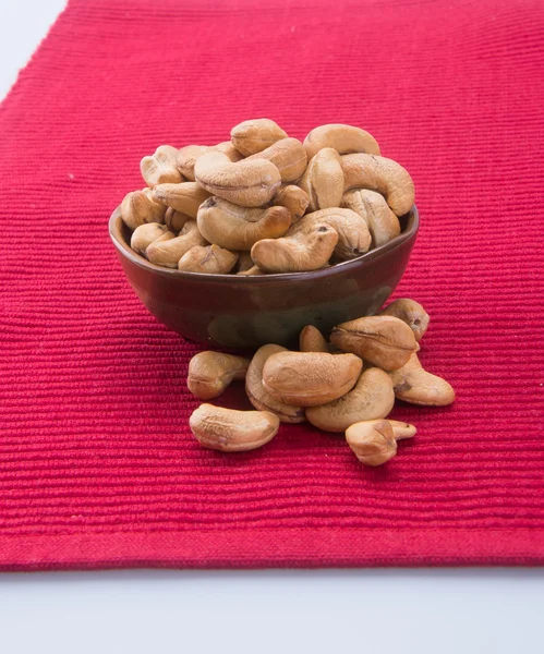 Nødder. cashewnødder på baggrunden - Stock-foto