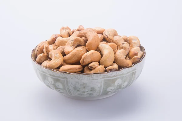 Nüsse. Cashewnüsse auf dem Hintergrund — Stockfoto