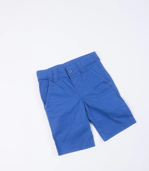 De pantalón. pantalones cortos de niño pantalón en un fondo —  Fotos de Stock