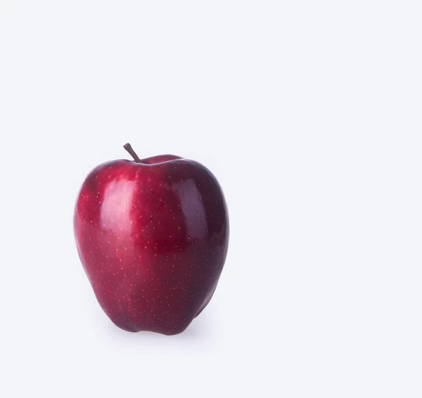 Apple eller rött äpple på en bakgrund. — Stockfoto