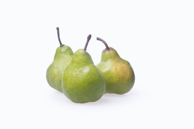 Armut veya bir arka plan üzerinde üç armut.