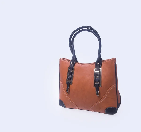 Çanta. kahverengi renk moda kadın çanta bir arka plan üzerinde. — Stok fotoğraf