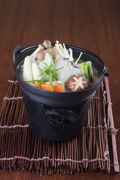 Japanese cuisine. hot pot on the background — Stock Photo, Image