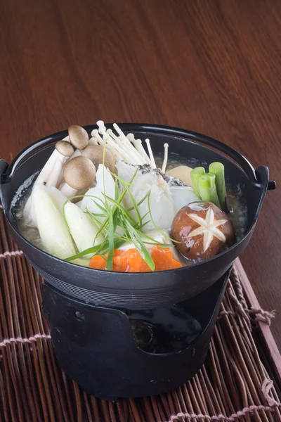 Japanese cuisine. hot pot on the background — Stock Photo, Image