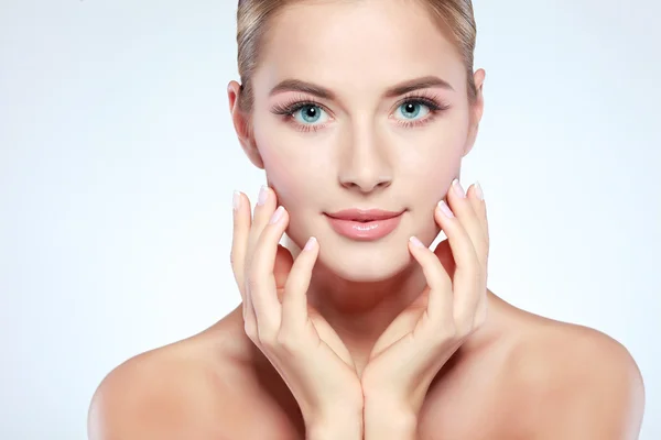 Closeup portrait of sexy whiteheaded young woman with beautiful blue eyes isolated on a light background, emotions, cosmetics — Stock Photo, Image