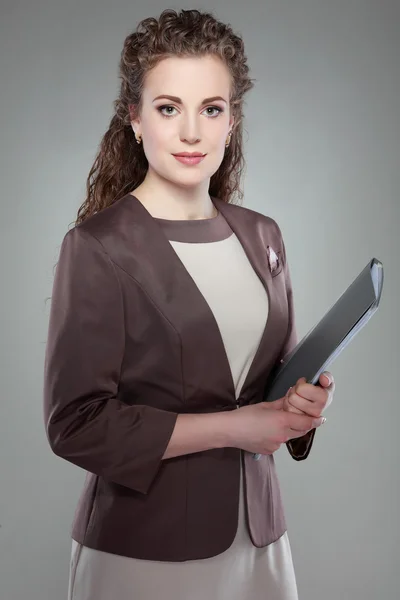 A portrait of beautiful business woman is in an official suit. Manager at work — Stock Photo, Image