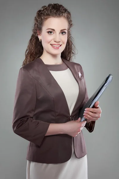 A portrait of beautiful business woman is in an official suit. Manager at work — Stock Photo, Image