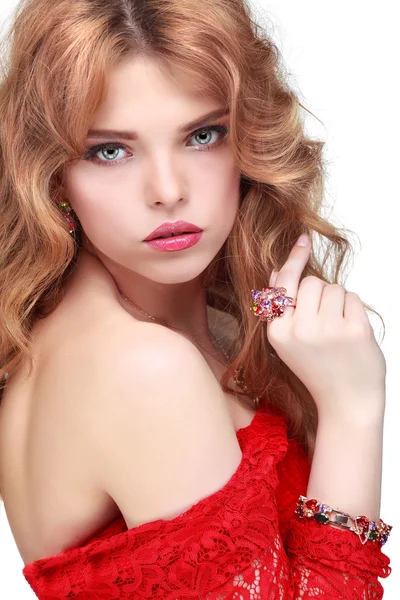 A beautiful young whiteheaded woman is in red clothes, isolated on a white background — Stock Photo, Image