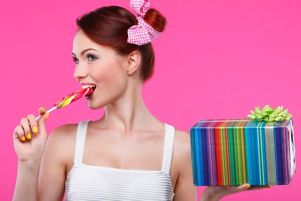 Redheaded girl with candy — Stock Photo, Image