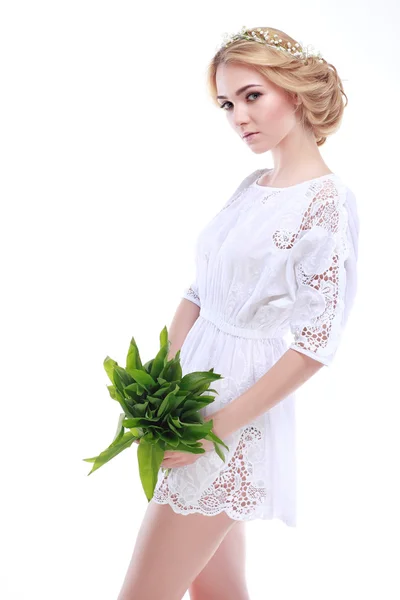 Beautiful sexual blonde  in white clothes with the basket of flowers isolated on a white background — Stock Photo, Image