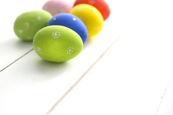 Hand painted colorful Easter eggs, shallow focus — Stock Photo, Image