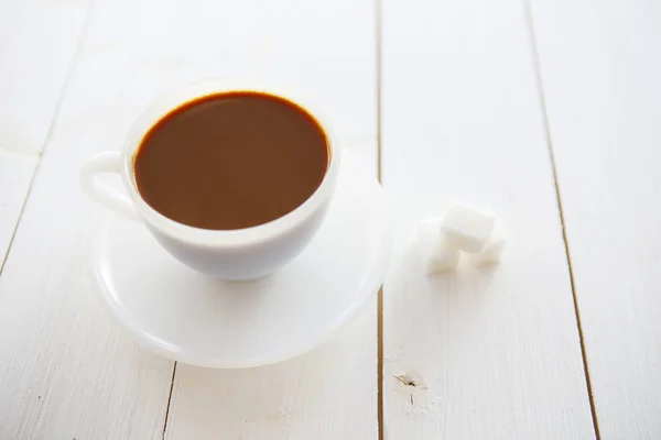 Kaffeetasse auf Holz — Stockfoto