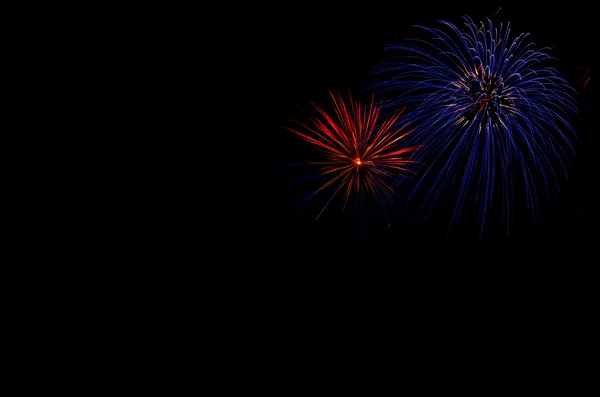 Firework over dark sky in summer night — Stock Photo, Image