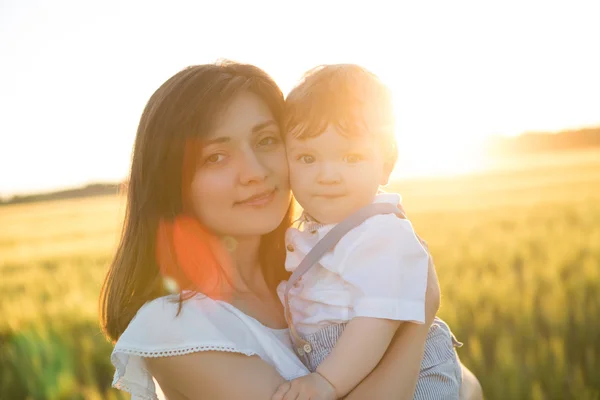 Portrait of fashionable baby boy and his mother — Stock Photo, Image