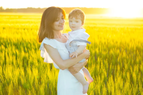 Summer portrait of mother and son on nature — Stock Photo, Image