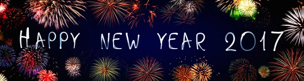 Šťastný nový rok 2017 psaný s neon světlo na černém pozadí — Stock fotografie
