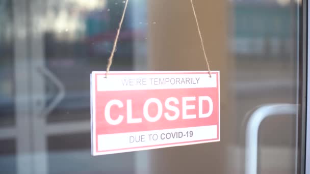 Sign we are open after covid. We Are Open Sign on the Glass Door — Stock Video