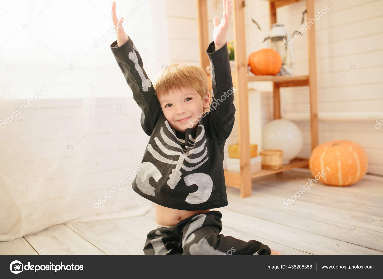 Little Cute Boy Skeleton Costume Ready Celebration Halloween Room Scenery Stock Photo by