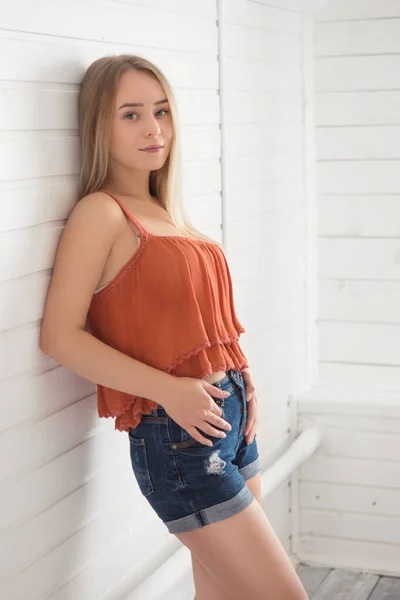 Young Blonde Woman Red Blouse White Wooden Background — Stock Photo, Image