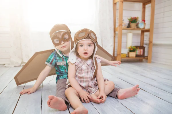 Two Little Children Wearing Pilot Costume Playing Room — Stock Photo, Image
