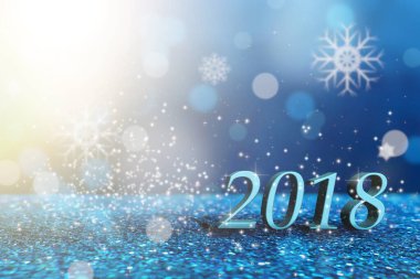 2018 mutlu yıllar. Mavi parıltılı yumuşak bokeh arkaplanındaki numaralar.