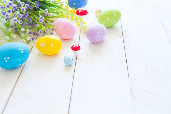 Colorful Easter Eggs Spring Flowers White Wooden Background — Stock Photo, Image
