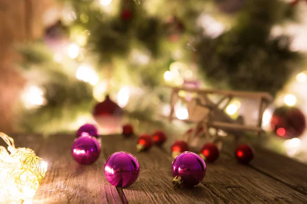 Christmas Holiday Background Wooden Airplane Christmas Red Balls Wooden Table — Stock Photo, Image